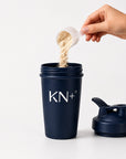 Blue tumbler with powder