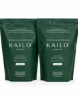 Two green packages of Kailo Nutrition plant-based supplement on a white background