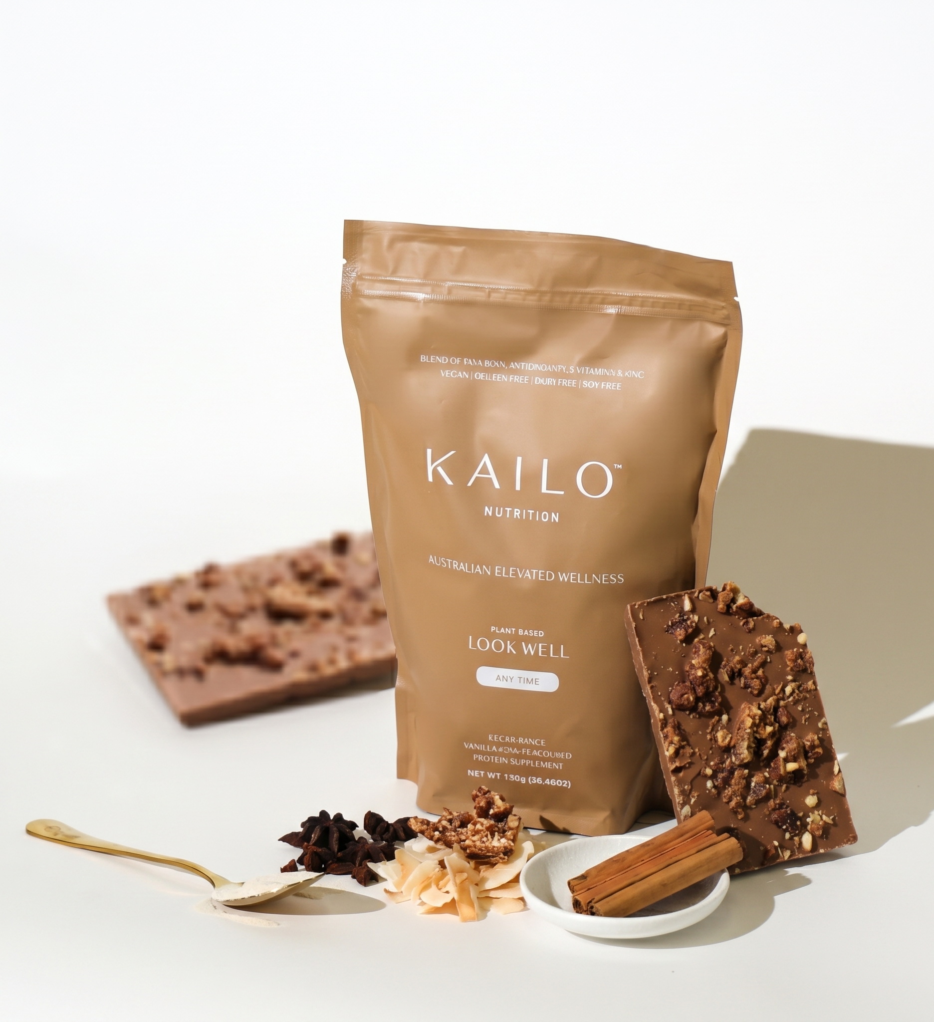 No-bake Kailo Vanilla-Chai protein slice topped with melted chocolate and crumbled Lamington Buddies Bar