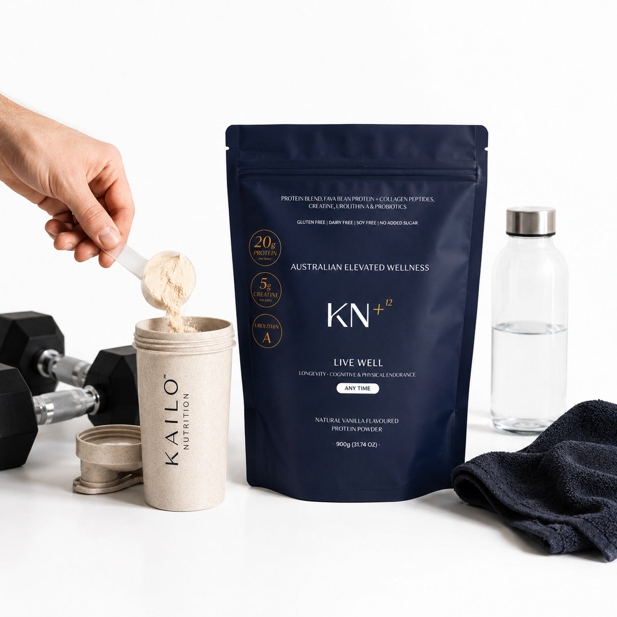 KN+12 protein powder packaging with a scoop and dumbbells on a white background