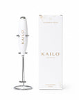 White handheld blender with Kailo branding next to its packaging on a white background