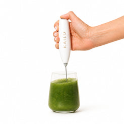 KAILO frother in a glass of green juice
