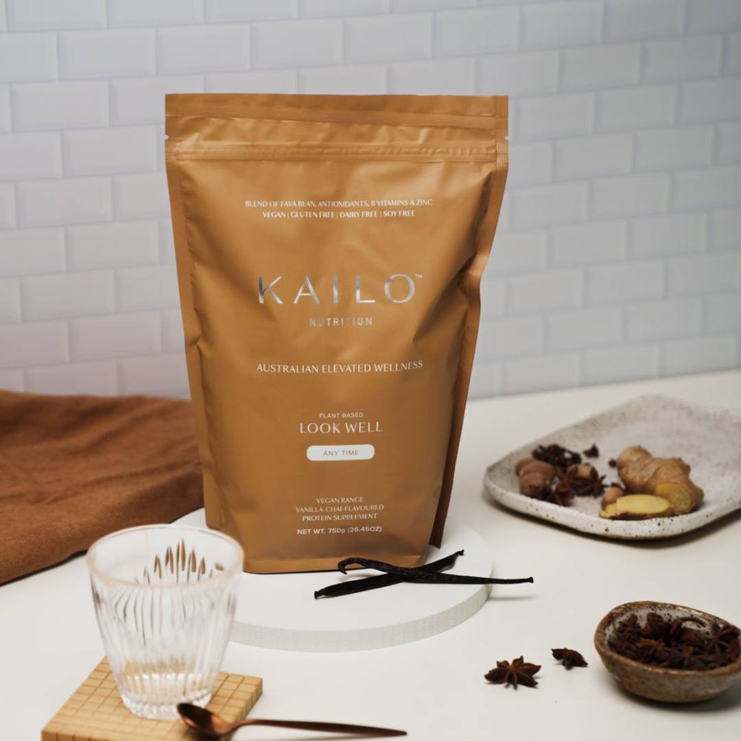 KAILO Nutrition package on a kitchen counter with ingredients and a glass.