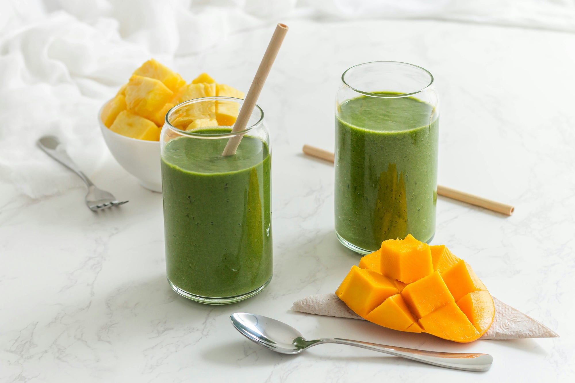 two glasses of green juice